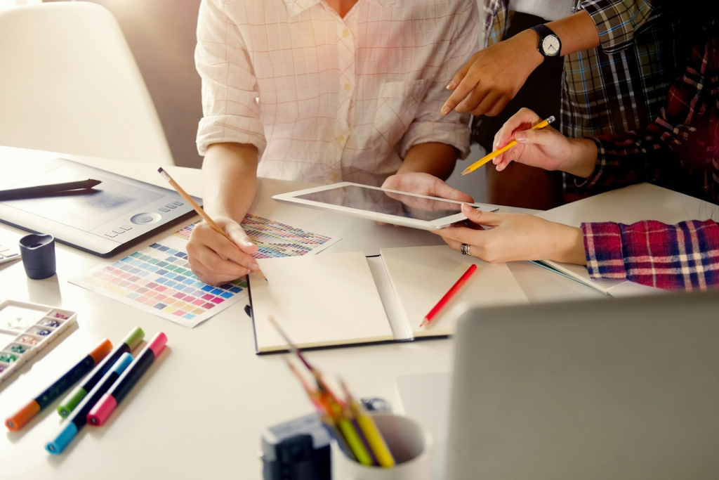 A creative business with lots of work happening on a desk